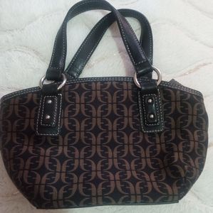 Fossil purse small in brown pattern.